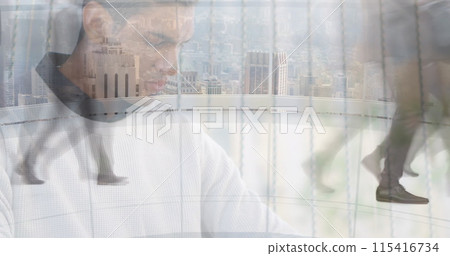 Image of man working on laptop over sped up commuters walking in modern building 115416734