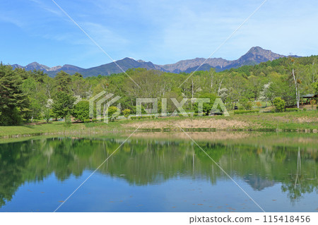 Yatsugatake in May as seen from Lake Maruyachi 115418456