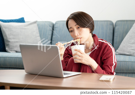 Woman in tracksuit: loss of appetite Woman in tracksuit: loss of appetite 115420087