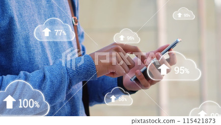 Digital composite of man in blue sweater using his mobile phone 115421873