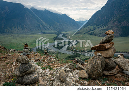 Picturesque green River Valley. Summertime natural landscape, mountains in the clouds, best recreation areas 115421964