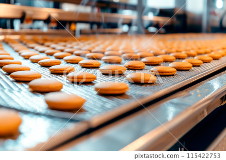 The bakery factory uses modern technology to automate cookie production on a specialized line The bakery factory uses modern technology to automate cookie production on a specialized line 115422753