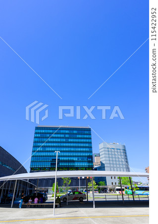 Kumamoto Station, shining on a beautiful, clear blue sky (Kumamoto Station Shirakawa Exit (East Exit) Station Square) [View from the Square] 115422952