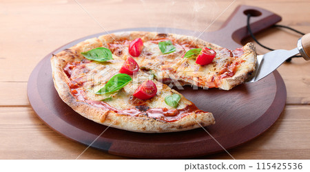 Pizza Margherita Buono Bouno means "delicious" in Italian. Pizza Margherita Buono Bouno means "delicious" in Italian. 115425536