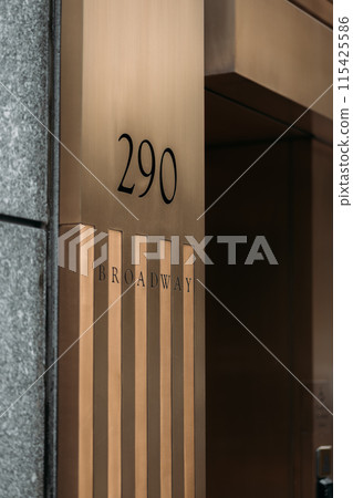 Entrance of 290 Broadway in New York City with modern architecture Entrance of 290 Broadway in New York City with modern architecture 115425586