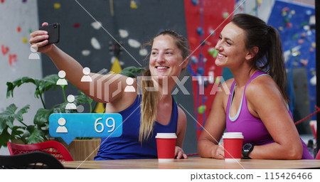Image of data processing over caucasian sportswomen taking selfie with smartphone 115426466