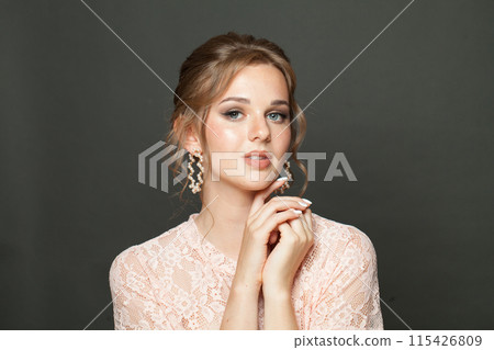 Studio portrait of fashionable model woman with natural make-up, healthy fresh skin  115426809