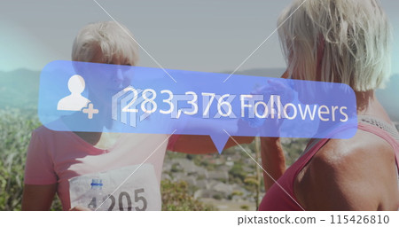 Image of social media notifica over happy senior women resting after marathon on beach Image of social media notifica over happy senior women resting after marathon on beach 115426810