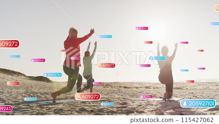 Image of social media notifications, over women doing yoga on beach 115427062