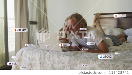 Image of network of connections with icons over man and woman using laptop Image of network of connections with icons over man and woman using laptop 115428741
