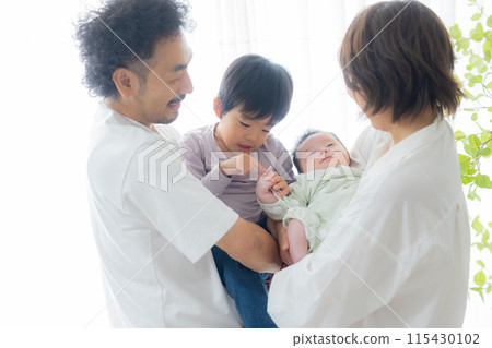 Family of four with baby Family of four with baby 115430102