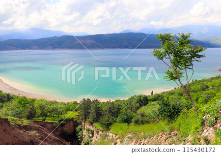 Aerial view of the Charvak reservoir, Tashkent region, Uzbekistan, Central asia. Top view on lake Charvak is a water reservoir in Bostanliq District, Czatkalski Rezerwat Biosfery 115430172