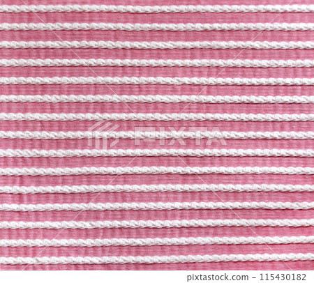 Light pink and white style striped fabric texture. Background with striped closeup weave fabric. Pinstripe material of pink and white color Light pink and white style striped fabric texture. Background with striped closeup weave fabric. Pinstripe material of pink and white color 115430182