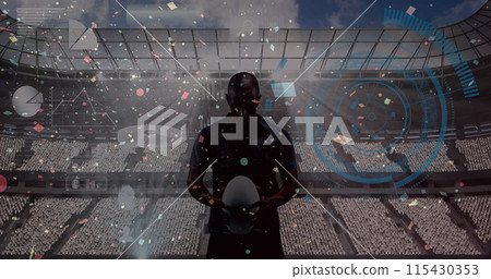 Confetti falling and round scanner against male rugby player holding a ball against sports stadium 115430353