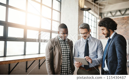 Business men, teamwork and reading on tablet for collaboration, research or results of startup investment. Professional manager, people or group planning on digital tech for sales or profit in office 115430487