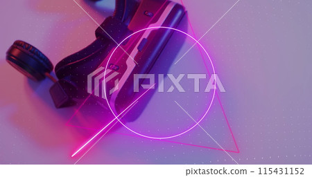 Image of neon shapes over image game computer pads Image of neon shapes over image game computer pads 115431152