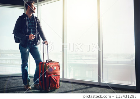 Travel, window and man with phone, suitcase and sightseeing in airport, journey and smile for California. Relax, waiting room and person with mobile, happy and trip for holiday, vacation and break 115431285