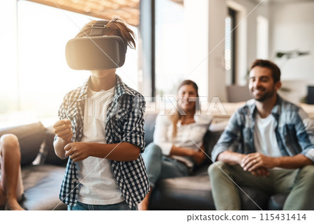 Parents, boy and virtual reality headset in home for cyber experience, metaverse system or gaming connection. Gamer family, child and VR games in living room for future, innovation and ui technology 115431414