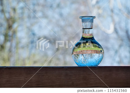 Glade reflection in a water bottle 115431560
