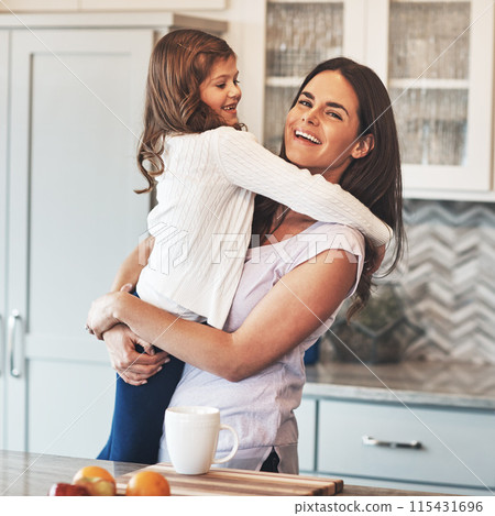 Portrait, mom and hug with girl, kitchen or smile in weekend, house and kid with love. Bonding, child and mother with daughter, embrace and together in morning, peace or breakfast in apartment 115431696
