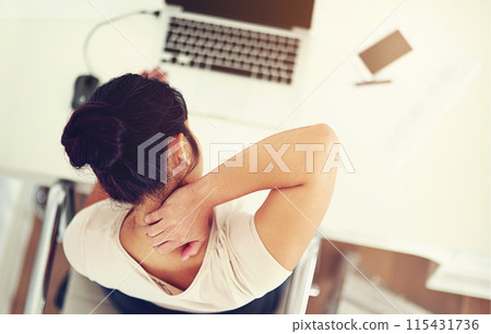 Laptop, office and woman with neck pain, stress and risk management in office from above. Tired, frustrated and businesswoman at computer for research with fatigue, online project and audit burnout 115431736