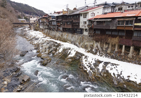 Row of cliff-built houses 115432214