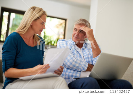 Couple, couch and document with laptop and stress, finances or taxes for debt in lounge. Paperwork, mature or man and female person for mortgage, upset and budget for inflation or bankruptcy in home Couple, couch and document with laptop and stress, finances or taxes for debt in lounge. Paperwork, mature or man and female person for mortgage, upset and budget for inflation or bankruptcy in home 115432437