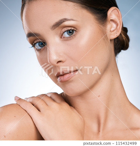 Woman, skincare and beauty with portrait in studio backdrop, satisfied and results for healthy skin in blue background. Female person, face and cosmetic with pride, glow and dermatology for wellness Woman, skincare and beauty with portrait in studio backdrop, satisfied and results for healthy skin in blue background. Female person, face and cosmetic with pride, glow and dermatology for wellness 115432499