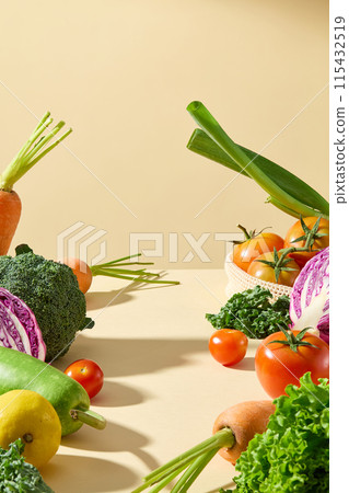 Variety vegetables displayed on both sides, leaving blank space in center for displaying product, which manufactured from natural ingredient. Photo was shot from front angle has space for text 115432519
