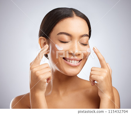 Skincare, woman and cream for beauty, treatment and routine facial cosmetics. Spa, wellness and skin glow dermatology on white studio background with black model, aesthetic and luxury collagen shine Skincare, woman and cream for beauty, treatment and routine facial cosmetics. Spa, wellness and skin glow dermatology on white studio background with black model, aesthetic and luxury collagen shine 115432704