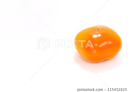 Seedless persimmon, whole, bright background 115432825