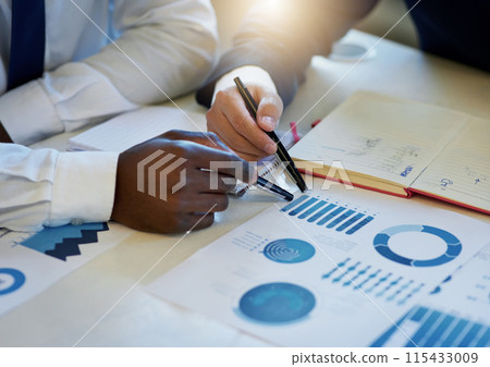 Business people, hands and writing with paperwork for finance, budget planning or corporate growth at office. Closeup of male person or employees with documents, graph or charts for company revenue Business people, hands and writing with paperwork for finance, budget planning or corporate growth at office. Closeup of male person or employees with documents, graph or charts for company revenue 115433009
