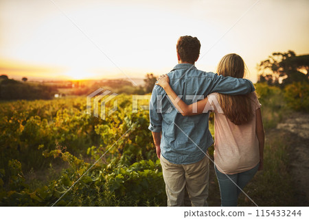 Back, hug and couple in farm, outdoor and bonding in nature, love and date for anniversary in park. Morning, partner and person with embrace, sunrise and peace in countryside, field or relax in Texas Back, hug and couple in farm, outdoor and bonding in nature, love and date for anniversary in park. Morning, partner and person with embrace, sunrise and peace in countryside, field or relax in Texas 115433244