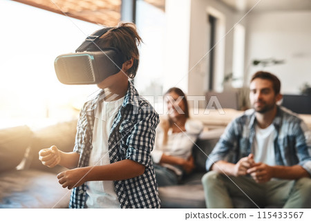 Parents, child and virtual reality headset in home or cyber experience, metaverse system or gaming connection. .Gamer family, boy and VR games in living room with future, digital world and technology Parents, child and virtual reality headset in home or cyber experience, metaverse system or gaming connection. .Gamer family, boy and VR games in living room with future, digital world and technology 115433567
