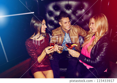 Happy people, toast and friends in nightclub with cocktails, drinks or champagne for vip event, memory or reunion. Group, man or excited women in dark disco party couch for alcohol or celebration Happy people, toast and friends in nightclub with cocktails, drinks or champagne for vip event, memory or reunion. Group, man or excited women in dark disco party couch for alcohol or celebration 115433917