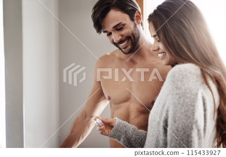 Couple, pregnancy test and love for results in home, maternity kit and smile for outcome in bathroom. People, together and support to check for baby news, future and ivf success for fertility stick 115433927