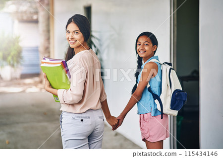 School, education and teacher support student to classroom for learning, assignment and lesson. Tutor, academy and educator portrait with girl for holding hands, teaching and studying for assessment 115434146