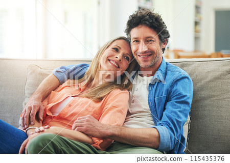 Happy couple, couch and hug in home with love, marriage and romance for man and woman in living room. Sofa, smile or support or solidarity for relationship, relax or trust for commitment and embrace 115435376