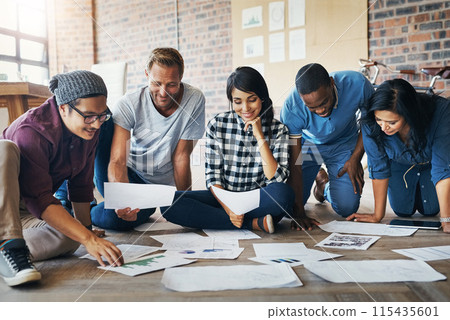 People, creative and happy in office with paperwork, collaboration and research for results. Nonprofit campaign, smile and ngo in workplace with donation or fundraising growth for community charity 115435601