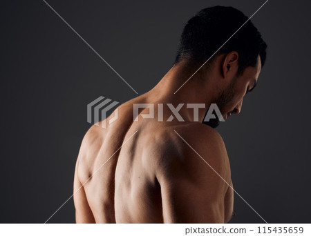 Sexy, muscle and back of man for exercise with workout, gym aesthetic and results for fitness goals in studio. Topless guy, bodybuilder and strong body with shoulder training by black background Sexy, muscle and back of man for exercise with workout, gym aesthetic and results for fitness goals in studio. Topless guy, bodybuilder and strong body with shoulder training by black background 115435659