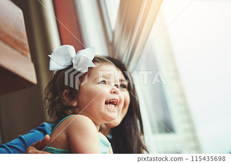 Woman, toddler and glass in apartment with window, love and family bonding in home together with girl baby. Childhood development, growth and curious or caring, mother and parenthood in house view 115435698