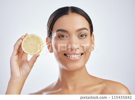 Skincare, portrait or happy girl with lemon in studio wellness, dermatology or vegan facial on white background. Fruit, face or model with sustainable beauty, citrus or eco friendly cosmetic product 115435842