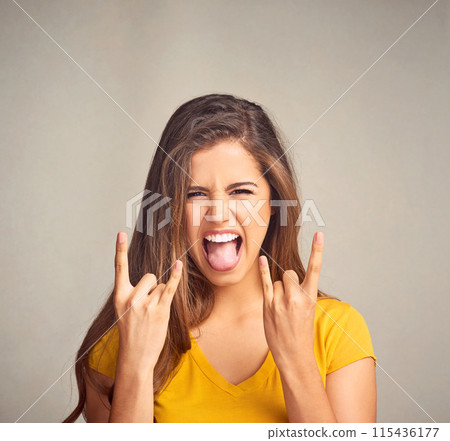Woman, portrait and hand gesture with rock n roll in studio for grunge sign, rockstar or devil horns on white background. Crazy, aesthetic and female model for emoji, punk icon or rebel symbol Woman, portrait and hand gesture with rock n roll in studio for grunge sign, rockstar or devil horns on white background. Crazy, aesthetic and female model for emoji, punk icon or rebel symbol 115436177