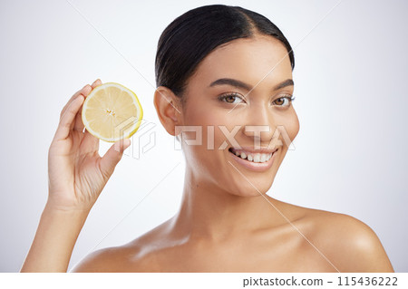 Skincare, portrait or happy woman with lemon in studio wellness, dermatology or vegan facial on white background. Fruit, face or model with sustainable beauty, citrus or eco friendly cosmetic product 115436222