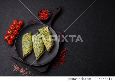 Delicious homemade pancakes with spinach, salmon, Philadelphia cheese Delicious homemade pancakes with spinach, salmon, Philadelphia cheese 115436415