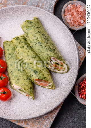 Delicious homemade pancakes with spinach, salmon, Philadelphia cheese 115436452