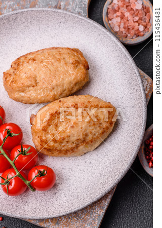 Delicious fresh fried minced cutlets with spices and herbs 115436481