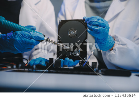 Close up of Technician measuring voltage electronic circuit board television, Service after sale fix electric equipment within insurance. Close up of Technician measuring voltage electronic circuit board television, Service after sale fix electric equipment within insurance. 115436614