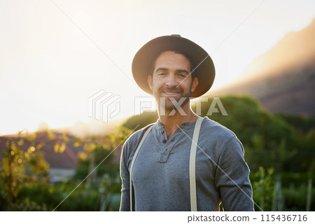 Garden, man and farmer portrait with agriculture, sustainability and eco farming work in the countryside. Smile, nature and field with plants, vegetables and outdoor with gardening and green project Garden, man and farmer portrait with agriculture, sustainability and eco farming work in the countryside. Smile, nature and field with plants, vegetables and outdoor with gardening and green project 115436716