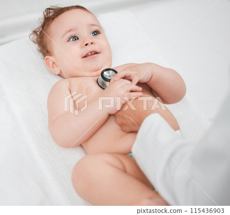 Stethoscope, baby and check up on bed for health, wellness and heartbeat in clinic. Pediatrician, infant and care in medical center for healthcare, growth and development with routine consultation Stethoscope, baby and check up on bed for health, wellness and heartbeat in clinic. Pediatrician, infant and care in medical center for healthcare, growth and development with routine consultation 115436903